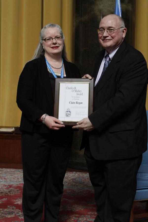 Claire Regan is the 2014 recipient of the Charles R. OMalley Award for excellence in teaching. She received her award at the 2014 CSPA spring convention advisers awards luncheon on March 21, 2014 at Columbia Universitys Low Rotunda.